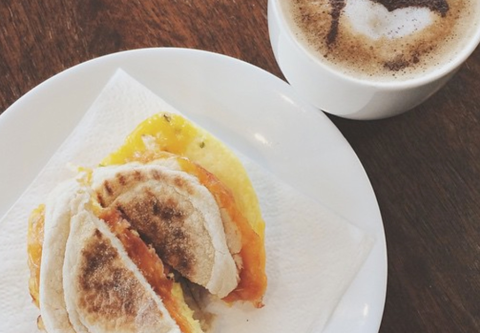 coffee and breakfast sandwich